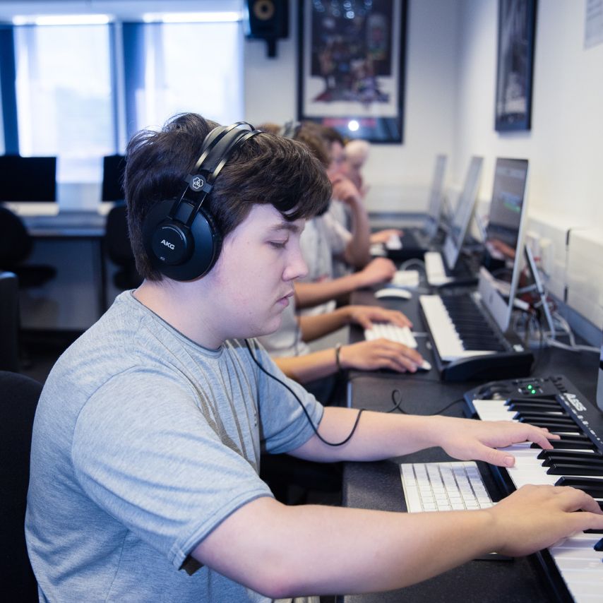 image of students in a computer room