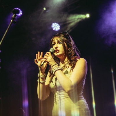 image of Manchester music student rehearsing and singing on stage