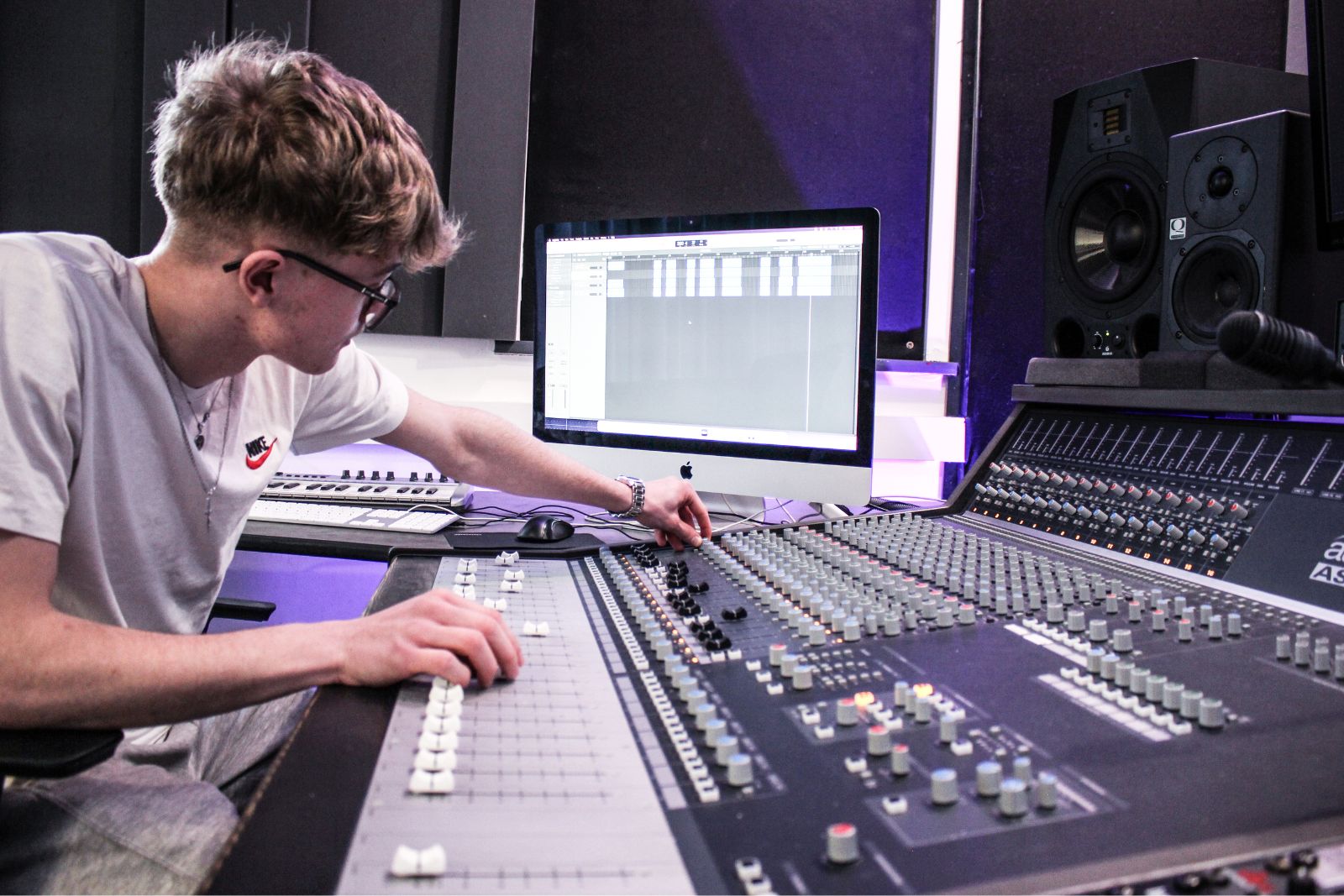 Plymouth student on mixing decks